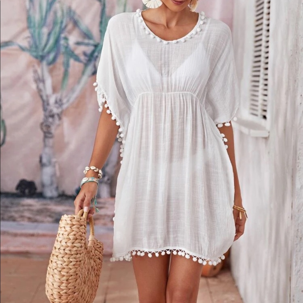 White swimsuit coverup